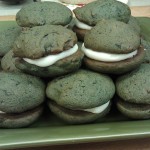 Plate of the blueberry whoopie pies with cream cheese filling